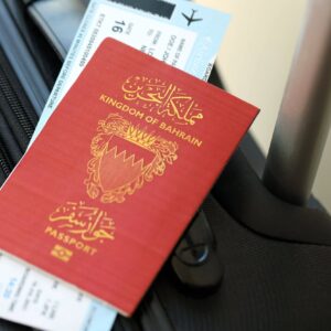 A citizen uses a laptop to get your bahrain passport online securely